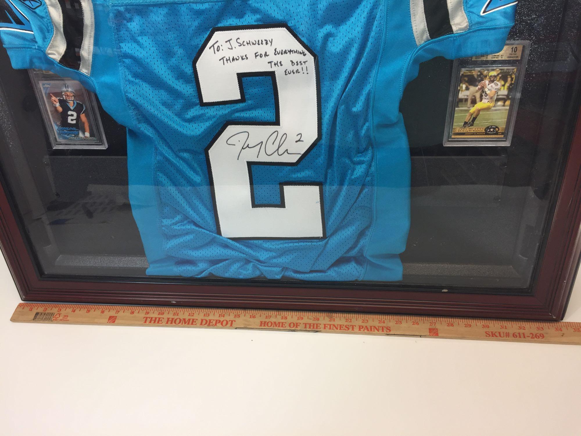 Framed Signed Jersey Says Jimmy Clausen 28in x 35in