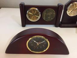 Lot of four mahogany desk clocks