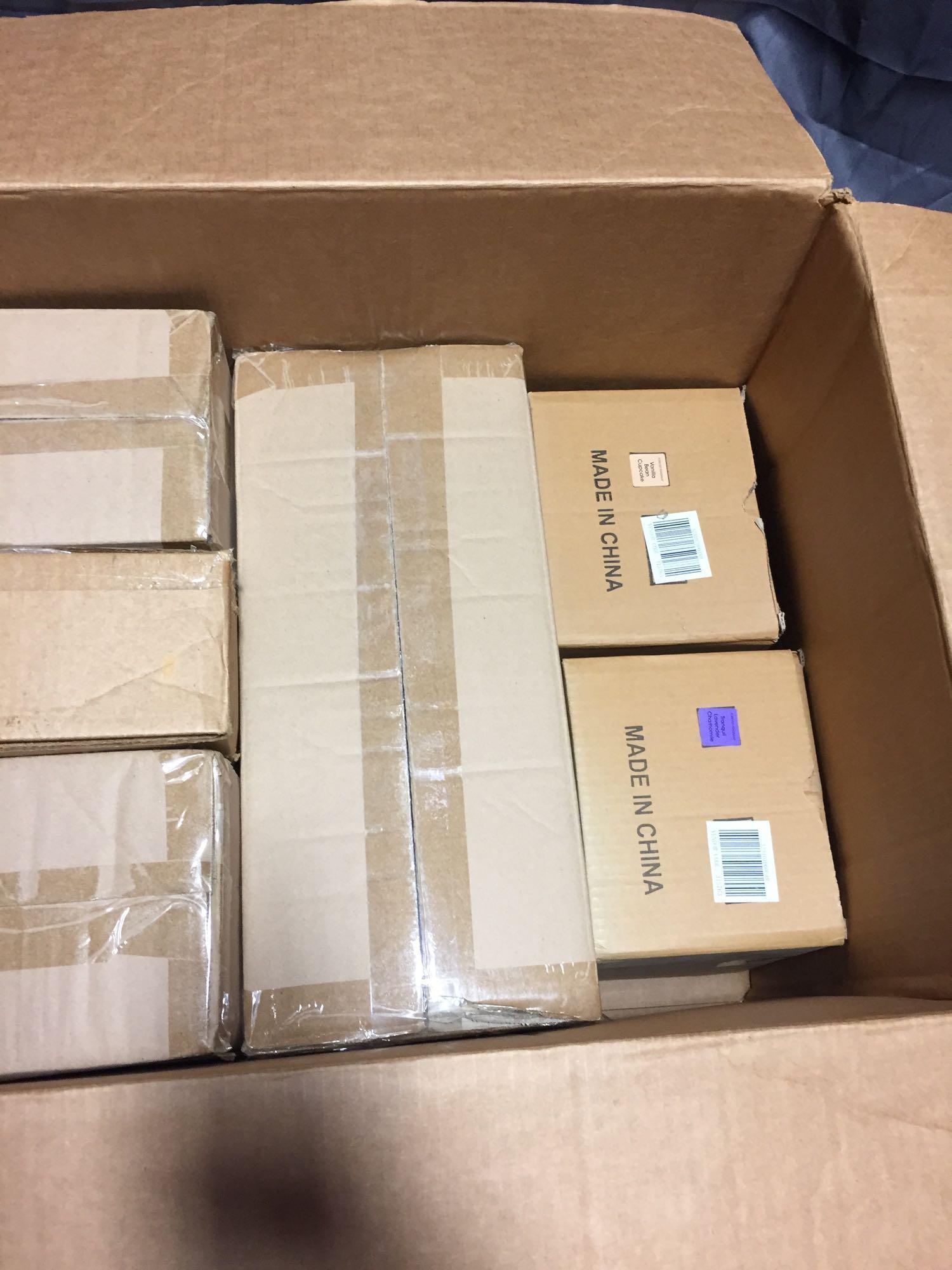 Boxes of miscellaneous Home Shopping Network products