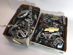 2 Boxes of various car lettering/emblems/ornaments