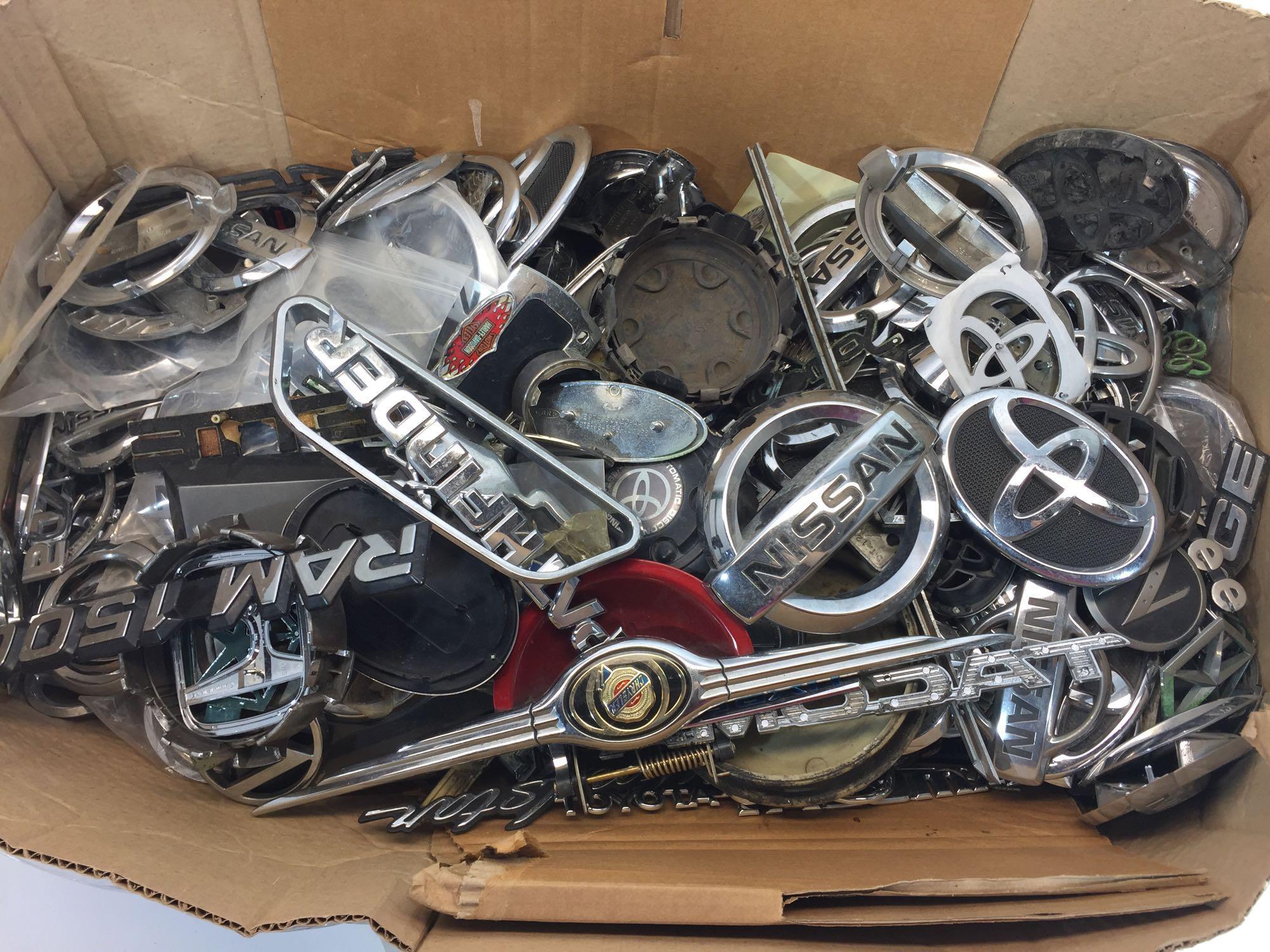 Large Box of various car lettering/emblems/ornaments