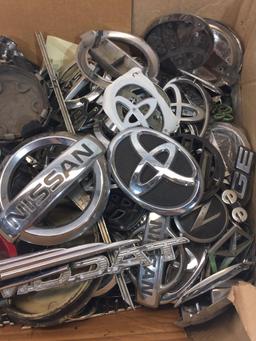 Large Box of various car lettering/emblems/ornaments