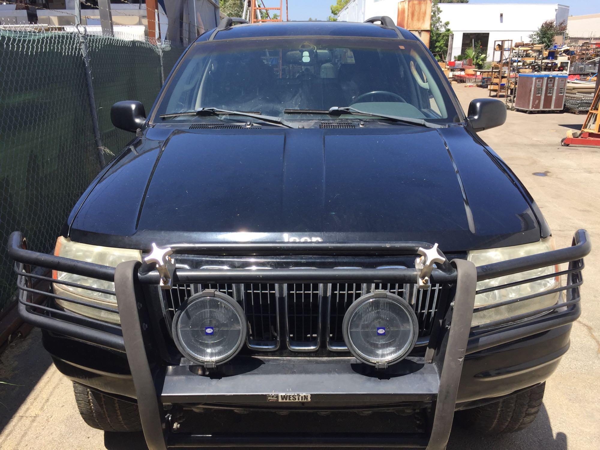 2002 Jeep Grand Cherokee Limited VIN 1J8GW58J52C257821 runs and starts.