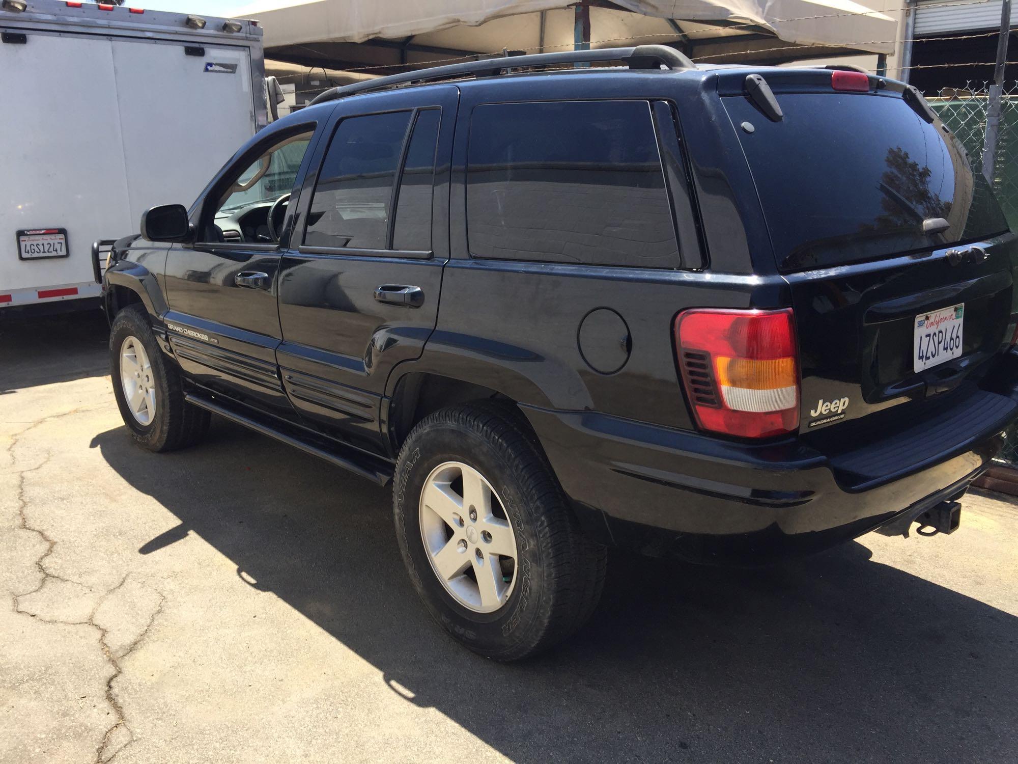 2002 Jeep Grand Cherokee Limited VIN 1J8GW58J52C257821 runs and starts.