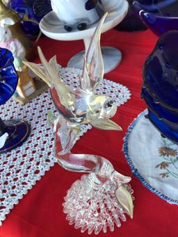 Tabletop of Glass and Ceramic Decorations