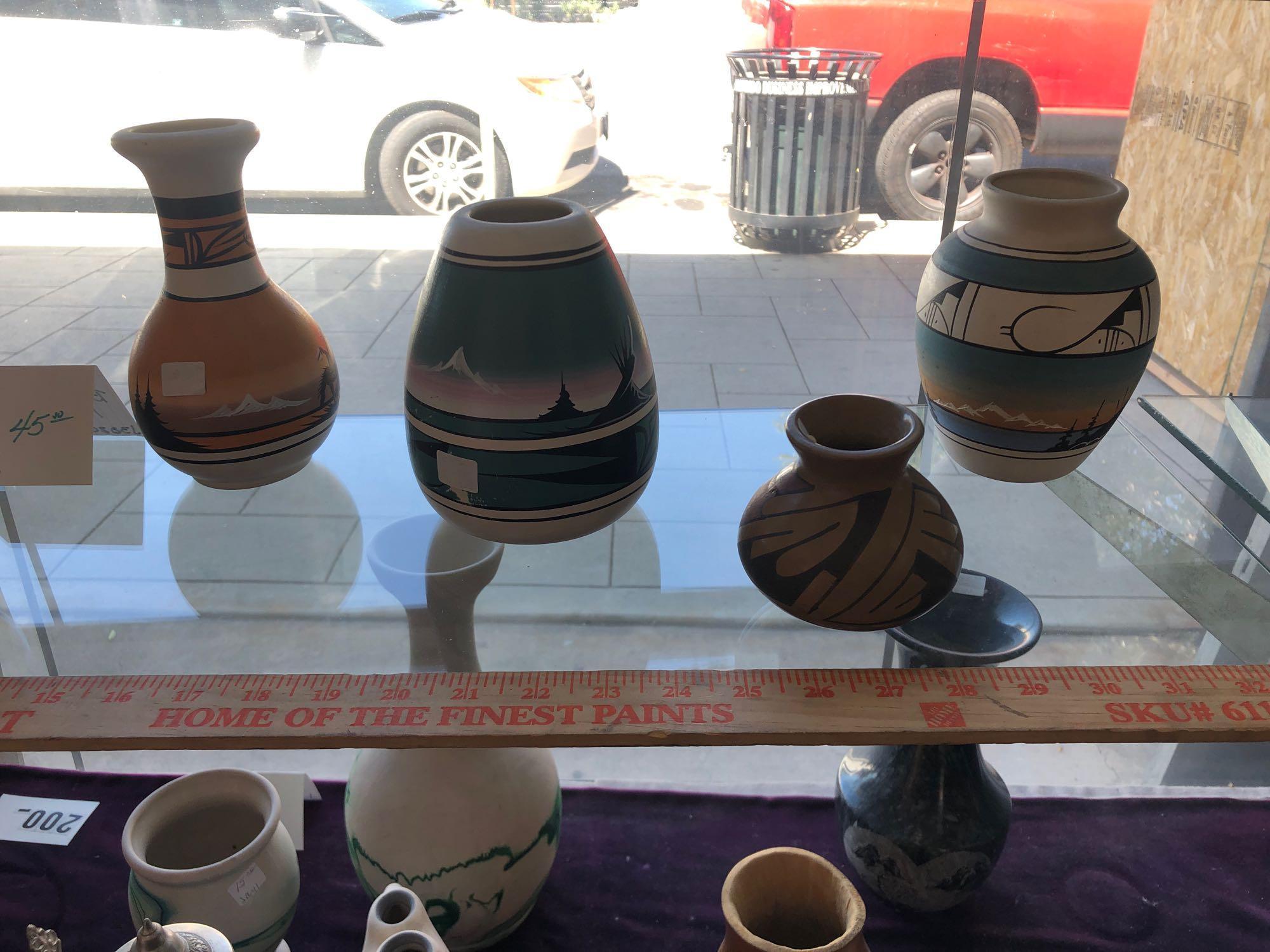 Shelves of Pottery and Sculptures