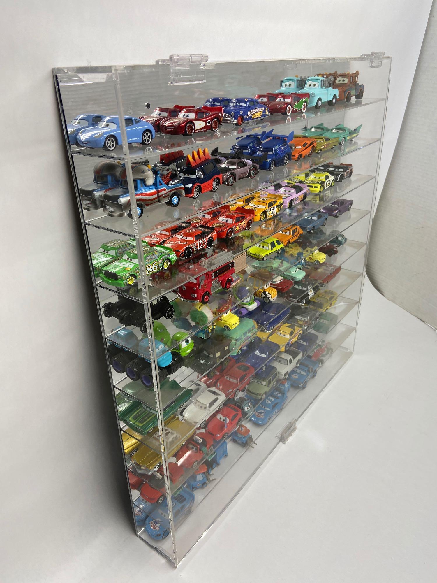 Pixar Cars Toys Collection in Mirrored Display Case 25x24in