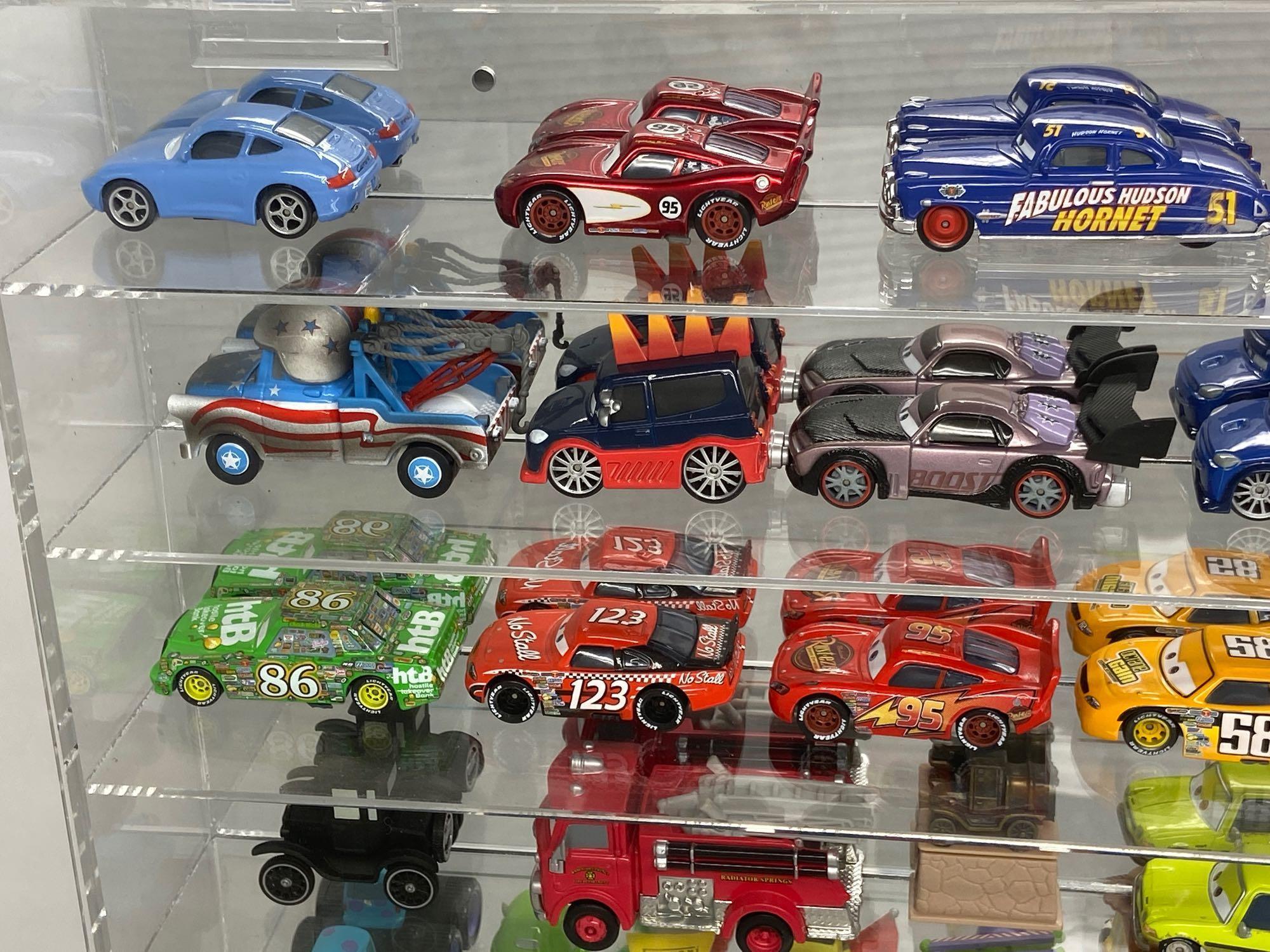 Pixar Cars Toys Collection in Mirrored Display Case 25x24in