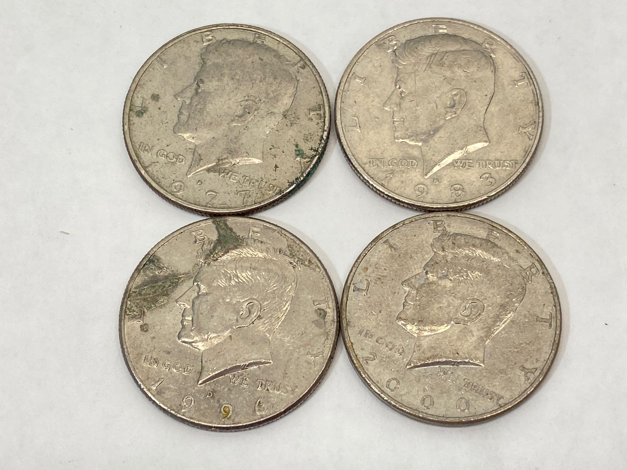 13 Kennedy half dollars U.S. half dollar coins, with 4 silver coins