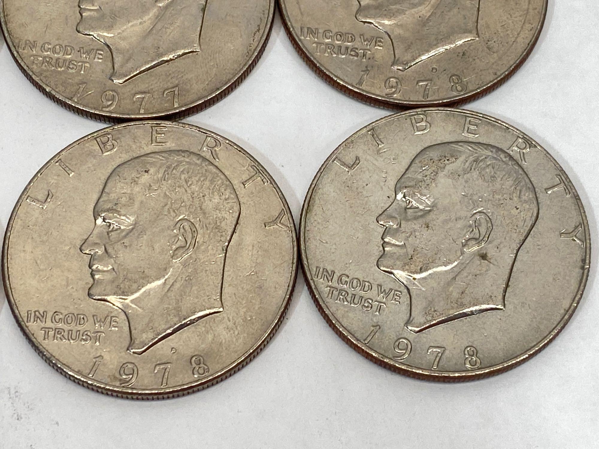 12 U.S. Eisenhower dollar coins, 1974, 1976-D, 1977-D,1977, 1978, 1978-D