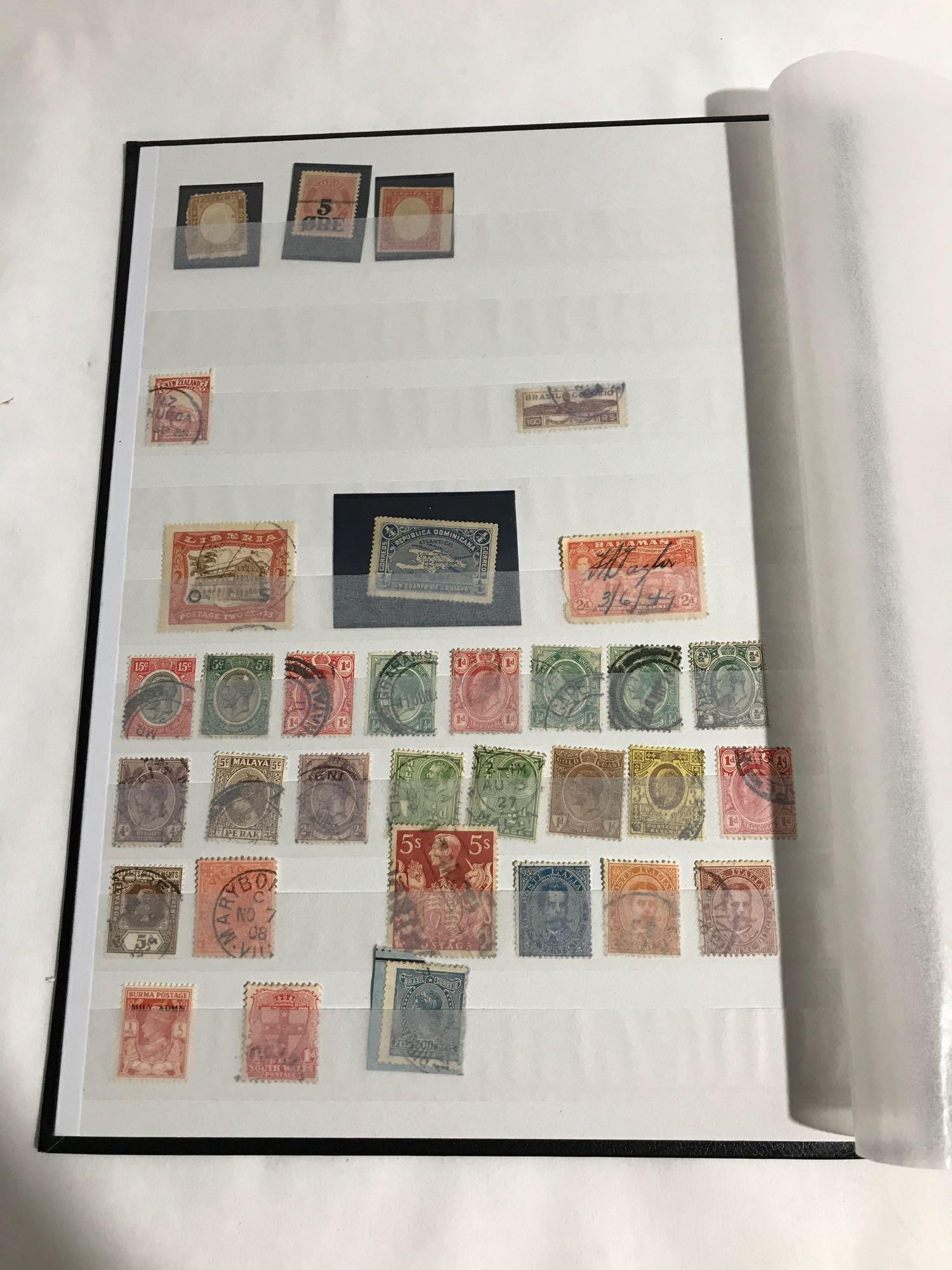 Stamp Book Full of Loose Stamps