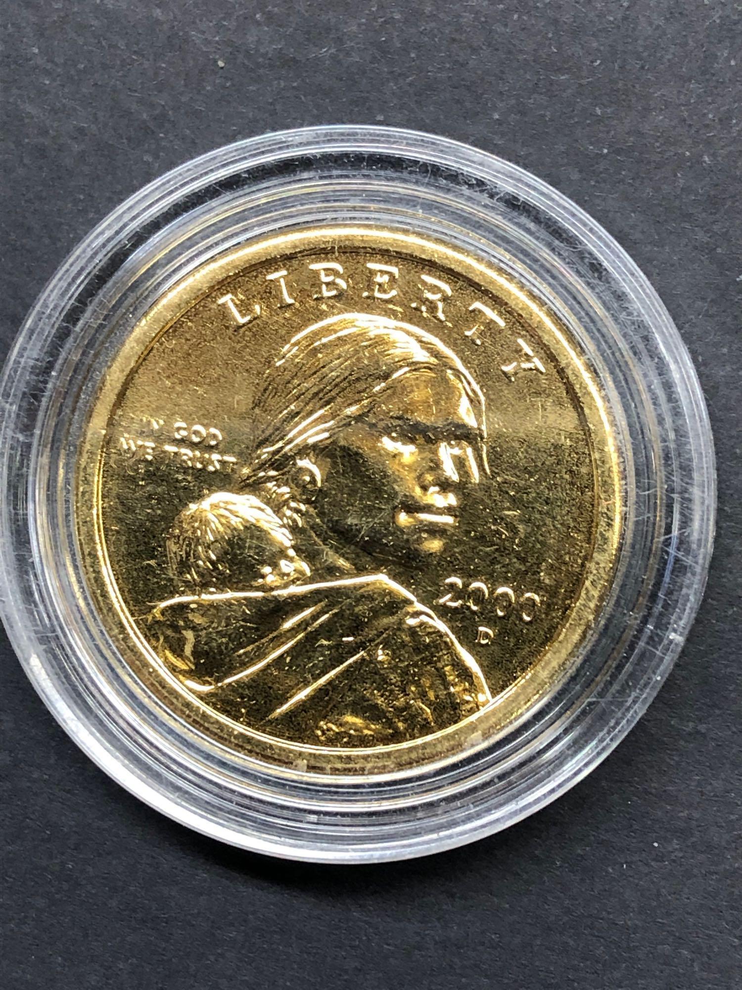 4 Coins, 1981 Dollar, 1979 Dollar, 24K Plated Sacagawea Dollar, 1986 Half Dollar