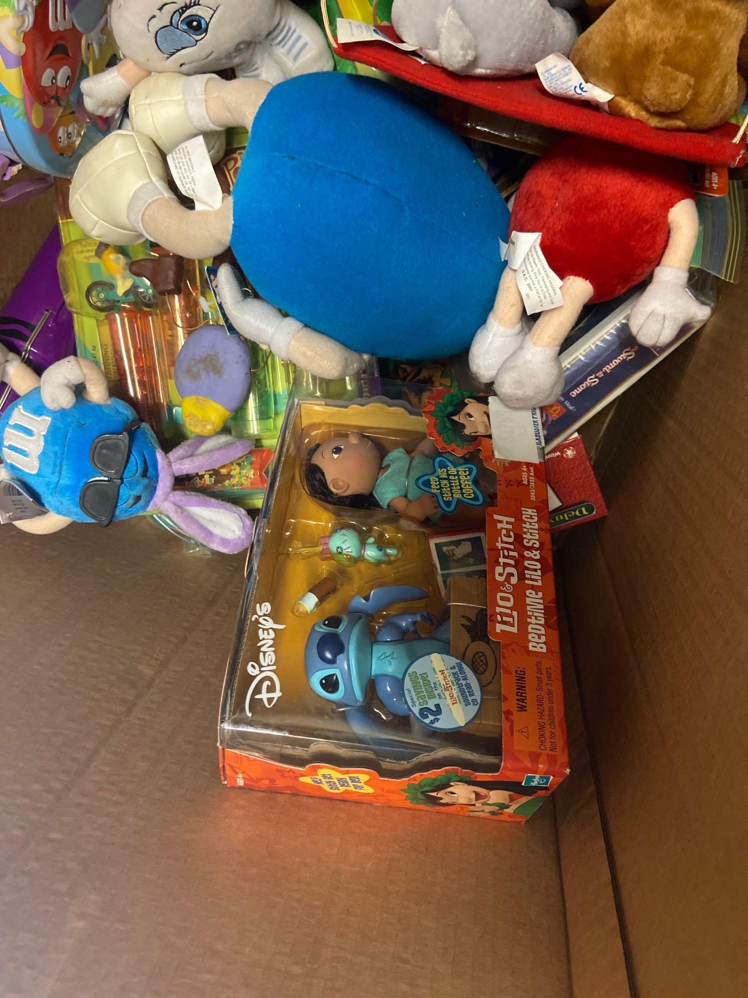 Box of various toys m&ms lilo and stitch etc
