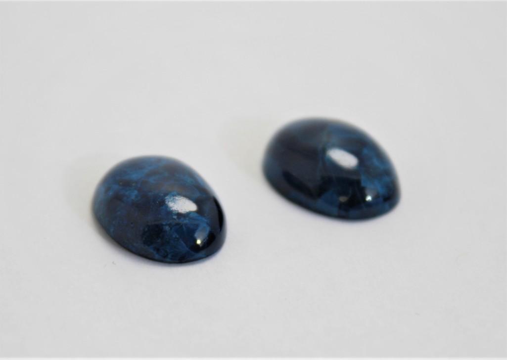 19.67ct Pair of Matching Cabochon Sugalite Oval Cut Gem Stones