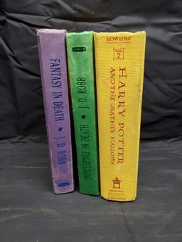 3 hard back books. Rowlings Harry Potter and the Deathly Hollows. JD RoBB Indulgence in Death and