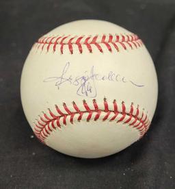 Autographed baseball says Reggie Jackson