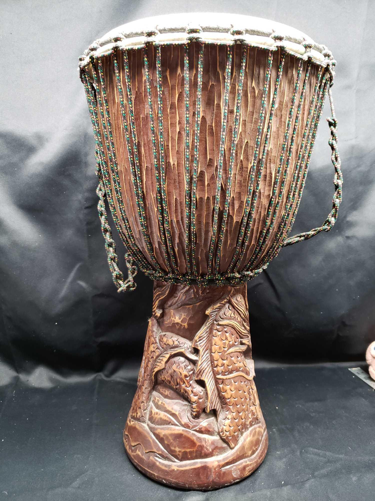 Tribal Bongo Drum with Dragon carved in th base.