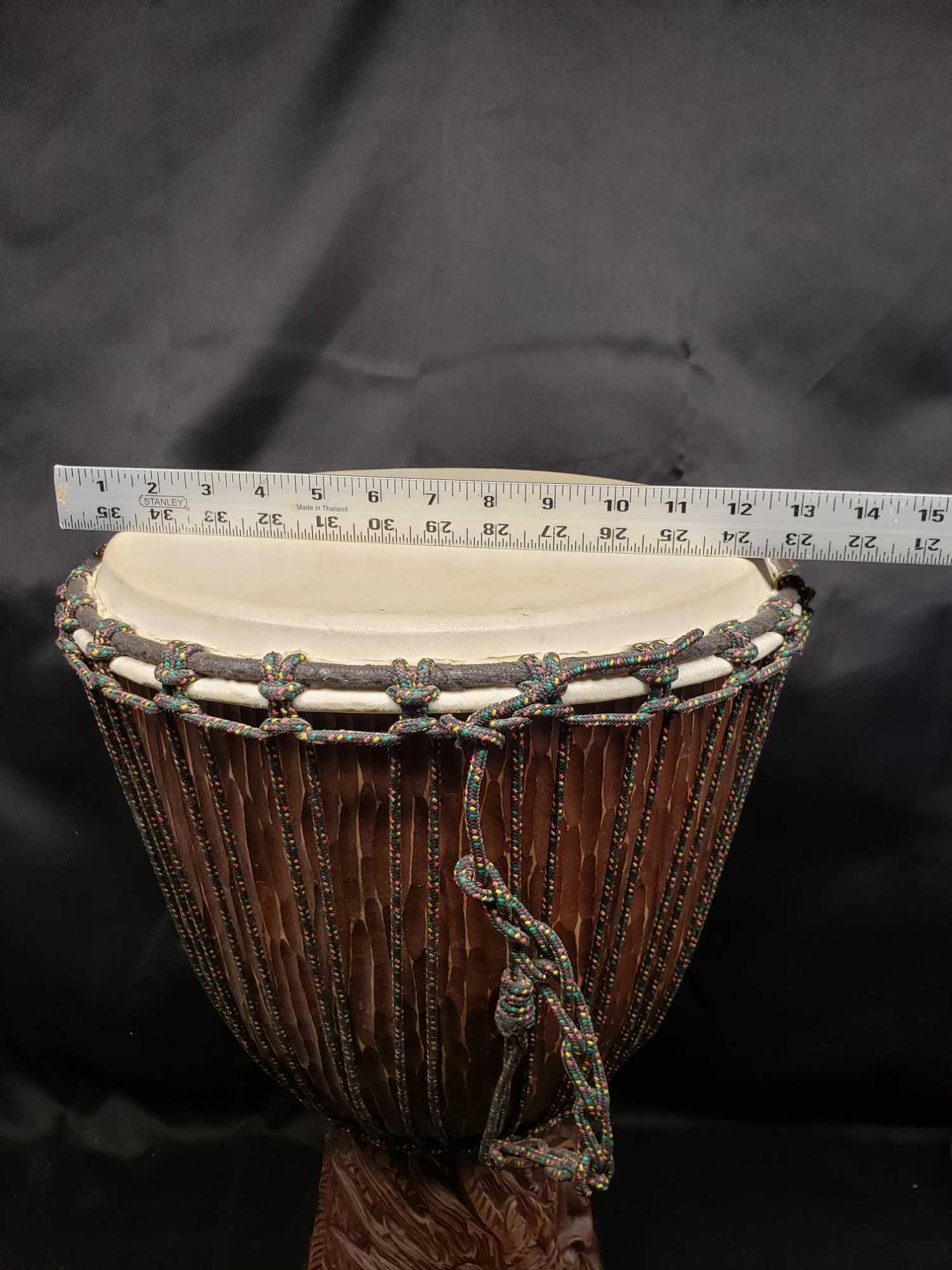 Tribal Bongo Drum with Dragon carved in th base.