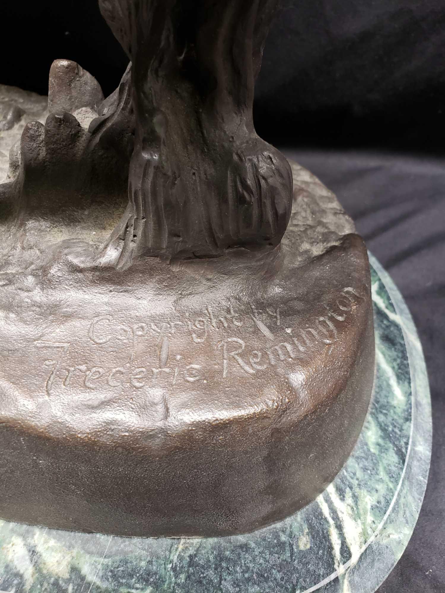 Bronze statue Plaque says Rattlesnake Frederick Remington