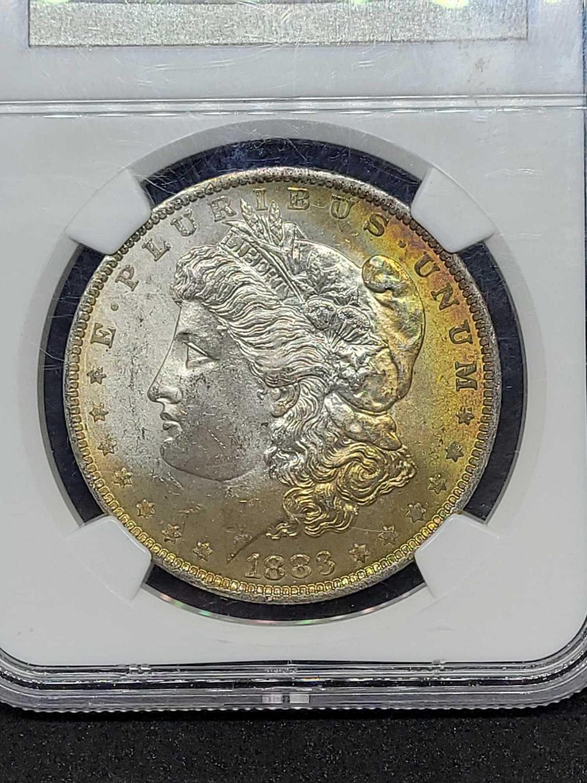 1883-O Morgan silver dollar MS63 Rainbow slab