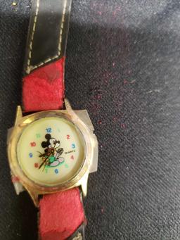 Mickey Mouse watches Lioney tunes pin and M an M pin