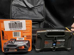 Ridgid 9.6 18v Charger and new Battery in carrying case.