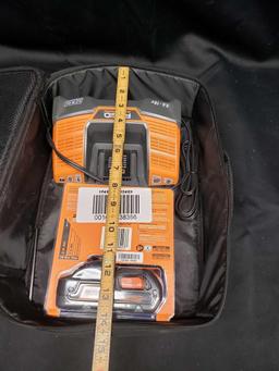 Ridgid 9.6 18v Charger and new Battery in carrying case.