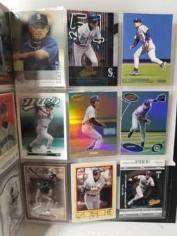 Binder of Ichiro Baseball Cards in Pages