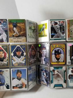 Binder of Ichiro Baseball Cards in Pages