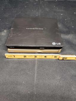 LG Slim Portable DVD Writers. Model GP65NG60. Model SP60NB50. Nontested. No cords