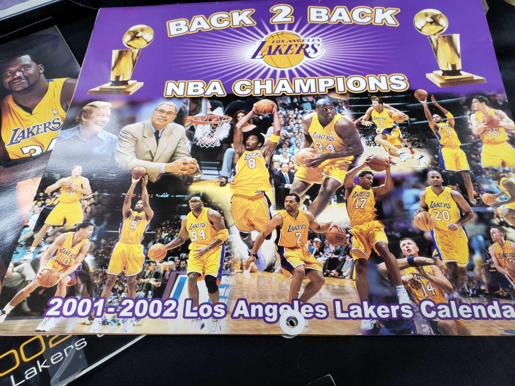 Lakers 50th Anniversary tickets. 2000 to 2004 Calendars. Sports illustrated presents Unstoppable and