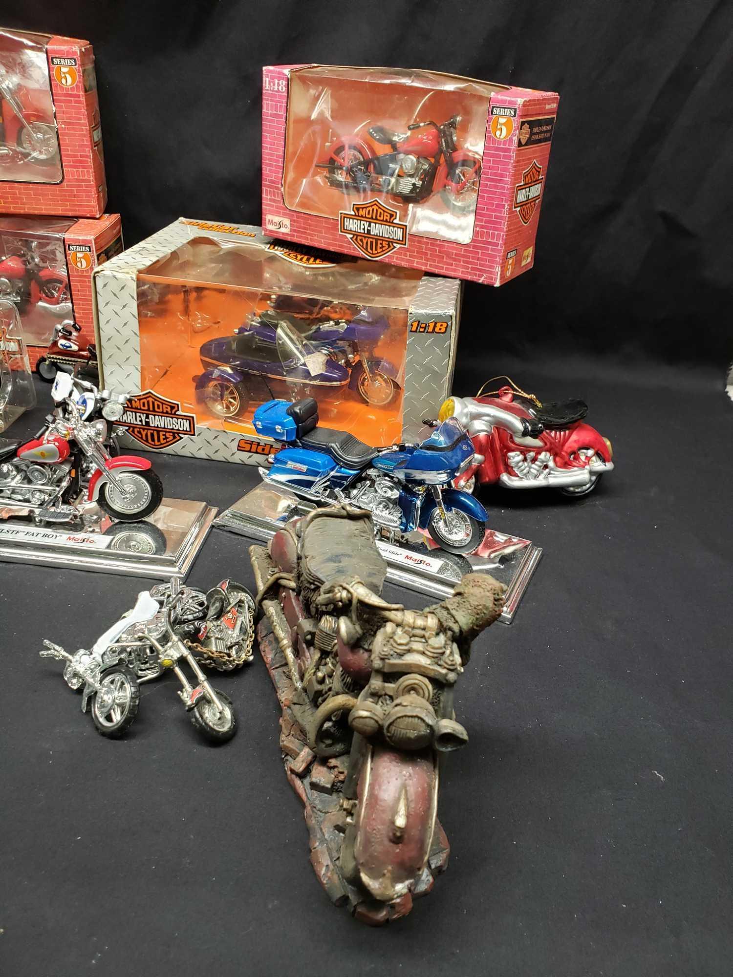 Harley-Davidson Maisto Die cast Metal with plastic parts.