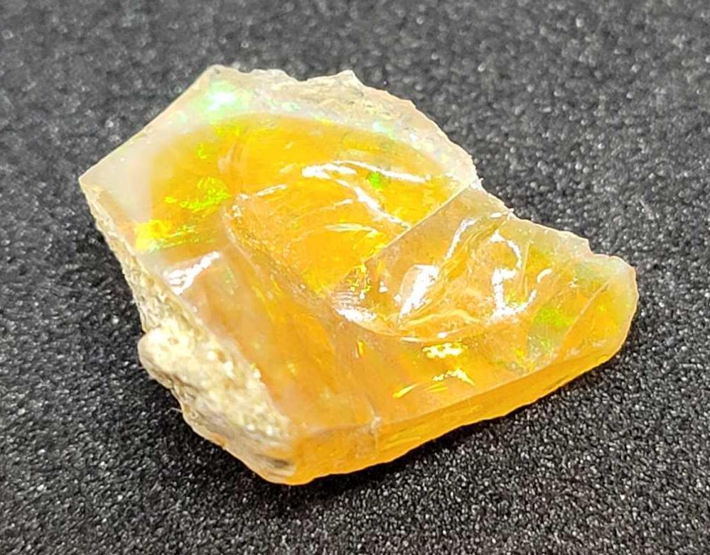 6.2ct Australian welo opal uncut rough orangy rainbow beauty