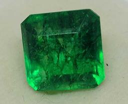 Emerald glowing green color with gem ID card square cut