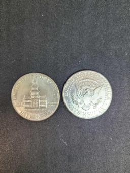 Kennedy half dollar's 1976 and 1992 2 coins