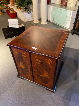 Italian inlaid cabinet with Copper music box records.