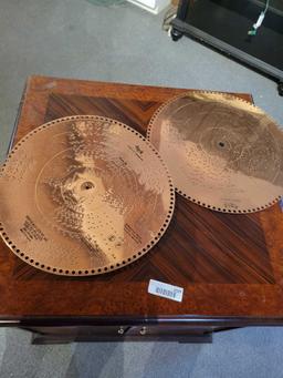 Italian inlaid cabinet with Copper music box records.