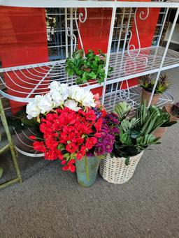 Multi tiered wrought iron display rack w plexiglass shelves. Pots and plants included