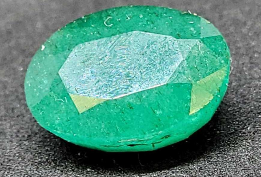 Green Emerald oval cut 12.80ct gemstone