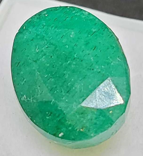 Green Emerald oval cut 12.80ct gemstone