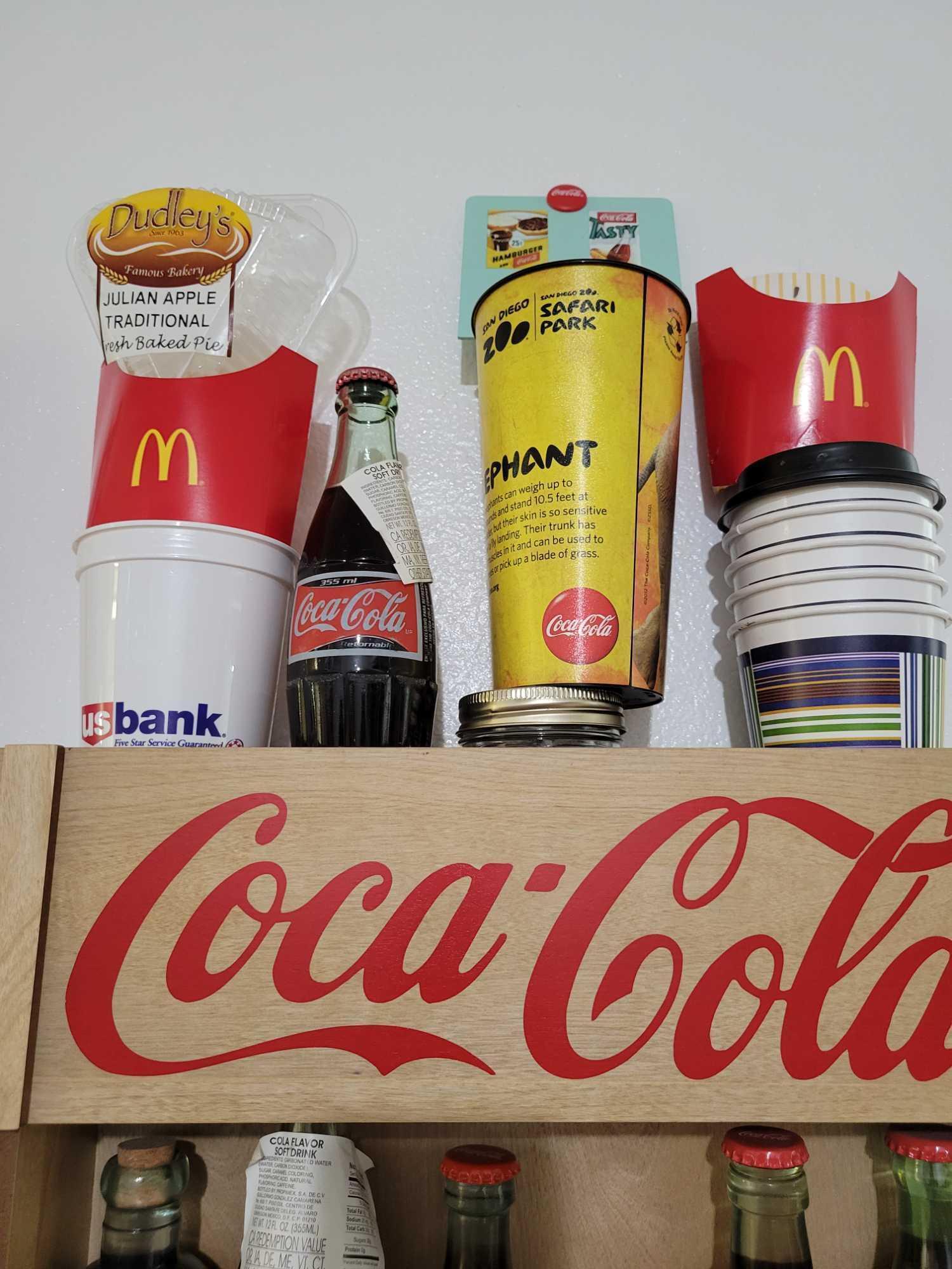 Vintage Coca Cola Bottles Display and Memorabilia