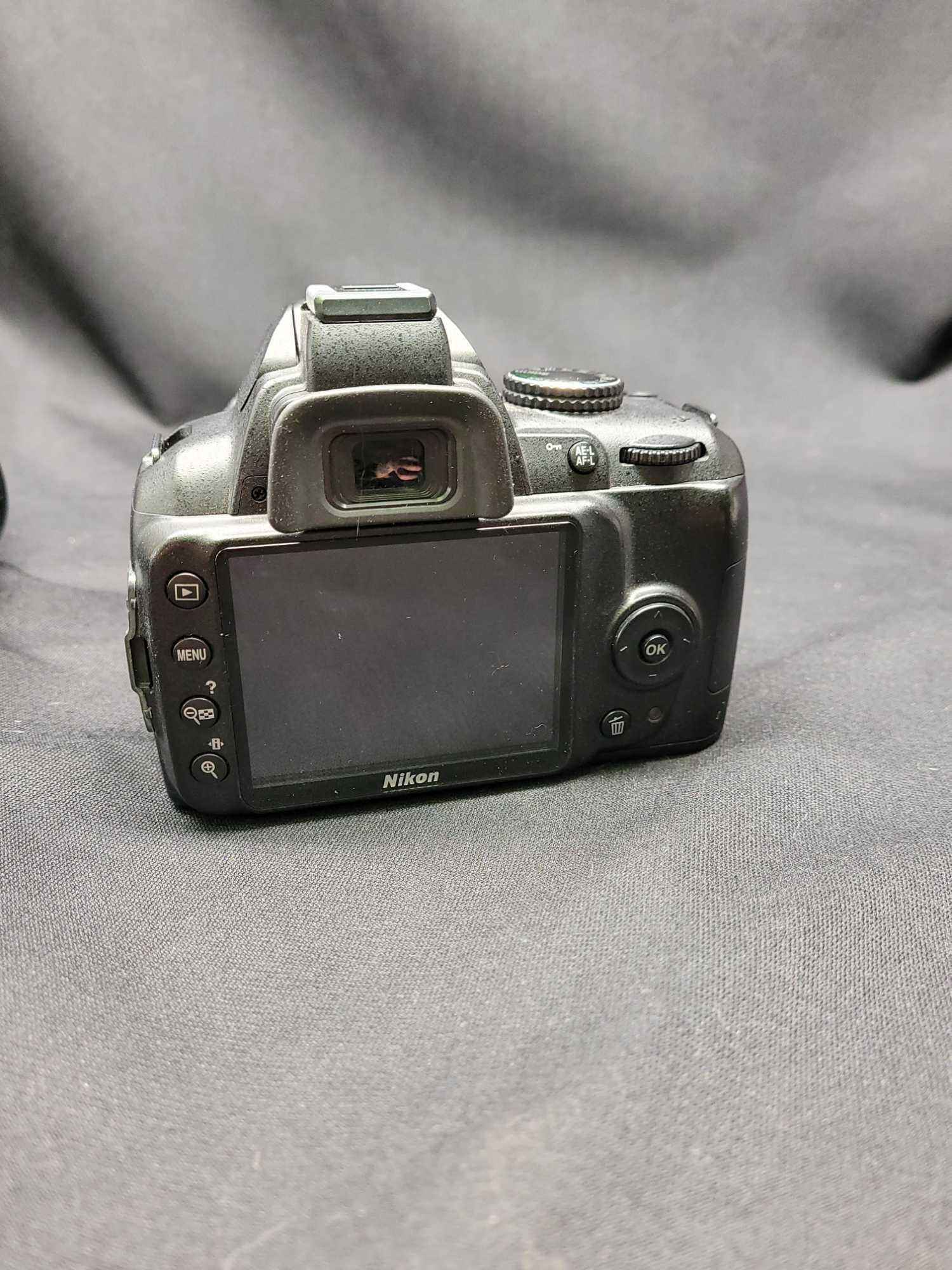 Nikon D3000 Digital camera With extra lens and Bag