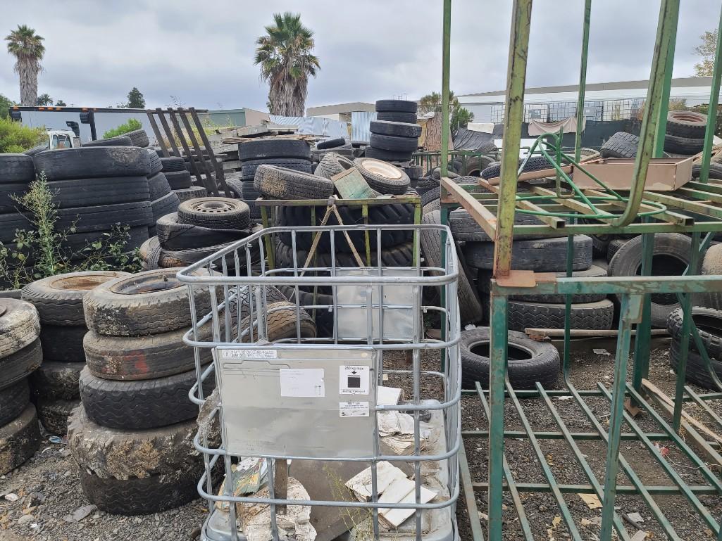 Tire Carriers Man Lift and Giant pile of tires - every size!