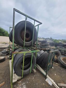 Tire Carriers Man Lift and Giant pile of tires - every size!