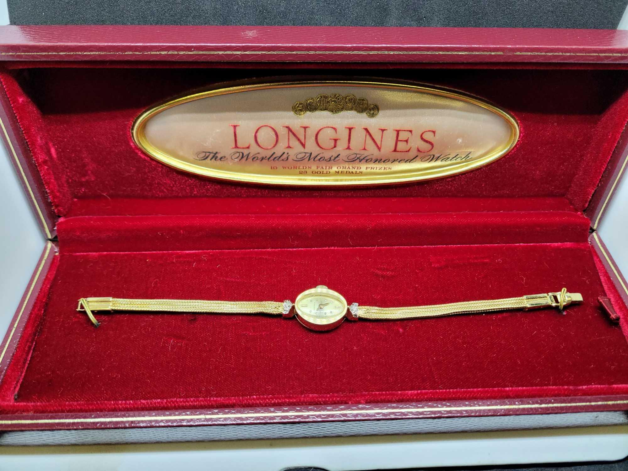 Longines 14k gold and diamond watch