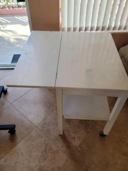 Two adjustable tables