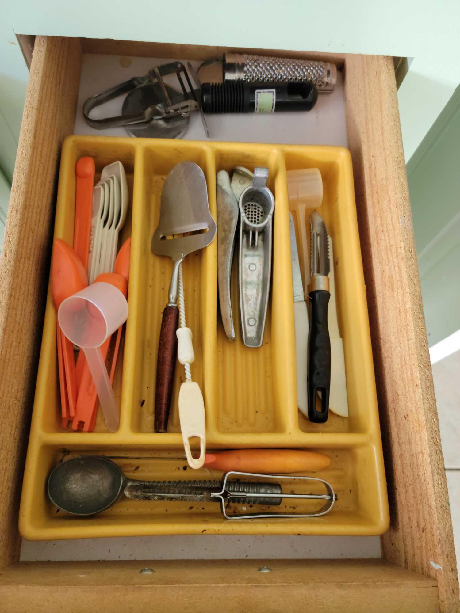 Contents of all Lower Kitchen cabinets