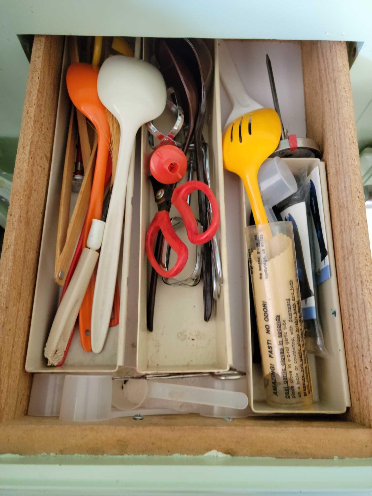 Contents of all Lower Kitchen cabinets