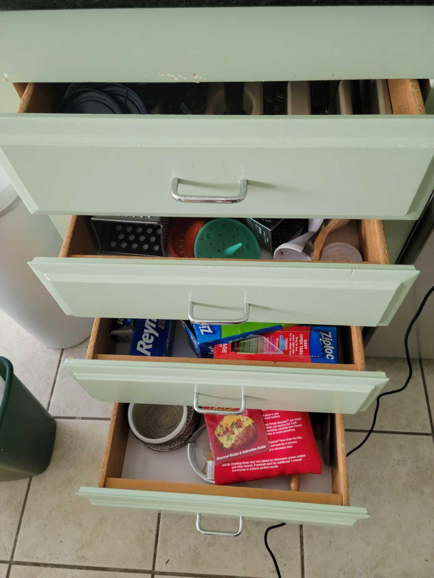 Contents of all Lower Kitchen cabinets