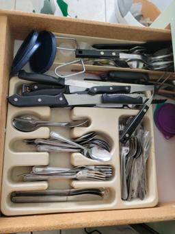 Contents of all Lower Kitchen cabinets